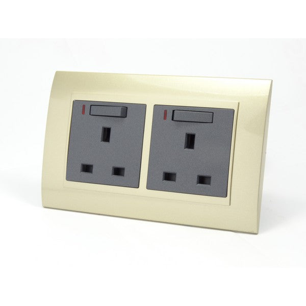 Gold Plastic Double Frame with dark grey insert of double switched neon uk socket